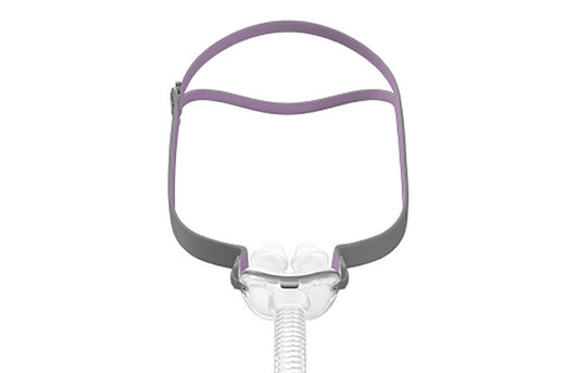 ResMed Airit P10 - For Her nasal pillows mask system shown from the front with its minimalistic design and pink headgear.