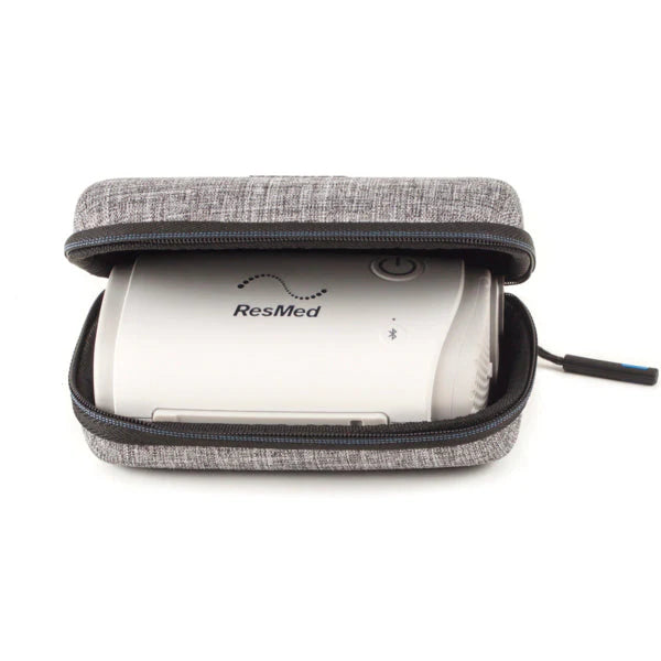 ResMed AirMini travel CPAP machine in a hard case for easy transport and therapy on-the-go.
