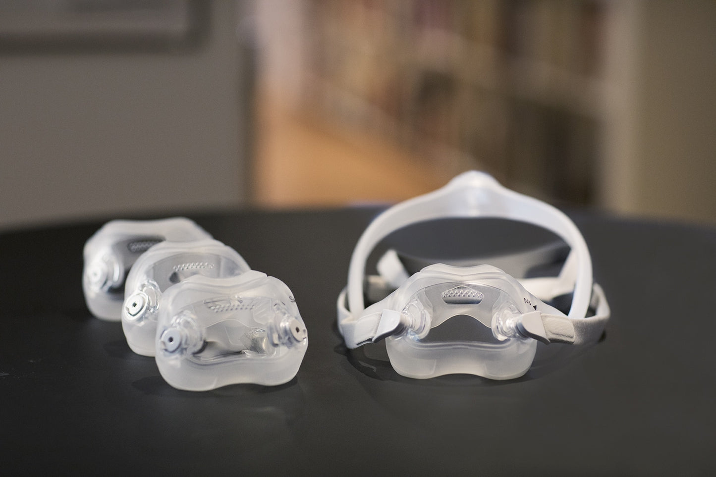 DreamWear Full Face Mask cushions showcased beside a fully assembled system.