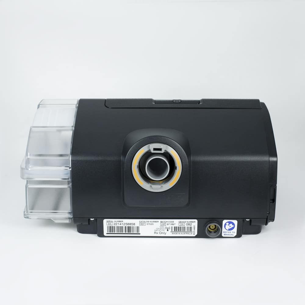 Back view of the AirSense 10 CPAP machine, highlighting the hose connection and side-mounted humidifier chamber.