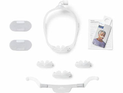 Dreamwear Nasal Pillows CPAP mask with all parts disassembled and showcasing. 