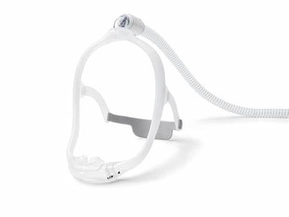 Dreamwear Nasal Pillows Mask system with an under-the-nose style, shown from the front view.