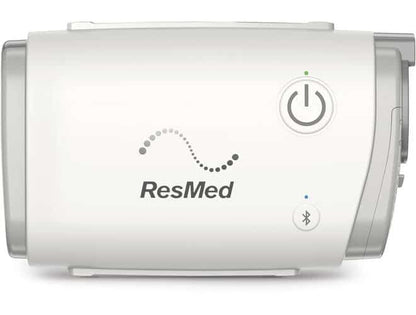 ResMed AirMini - Travel CPAP close up showcasing the logo and power button